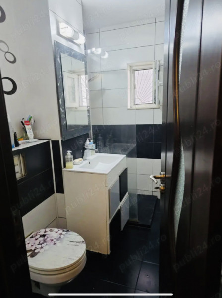 🏡 Apartament cu 3 camere, 2 băi, balcon și boxă — parter înalt, zona Eliberării